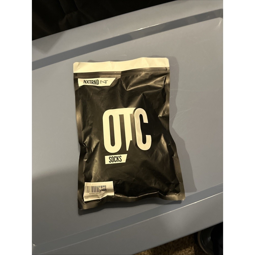 OTC nxtrnd football socks size S/M black new in package ankle heel toe comfort